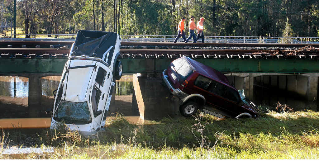 FORCE OF NATURE: The horror of Friday night’s deaths at Caboolture is revealed by the position of two cars swept away between Dances and Beerburrum roads. FORCE OF NATURE: The horror of Friday night’s deaths at Caboolture is revealed by the position of two cars swept away between Dances and Beerburrum roads.